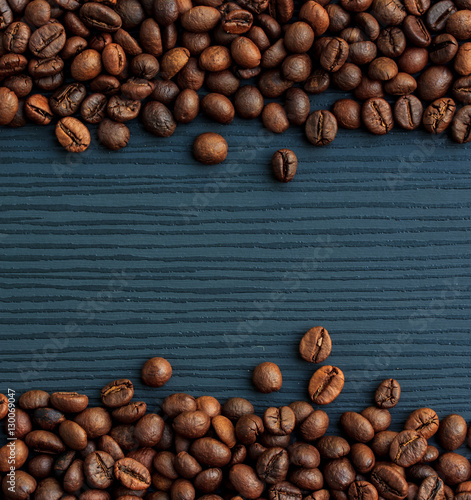 Coffee beans on dark wood background