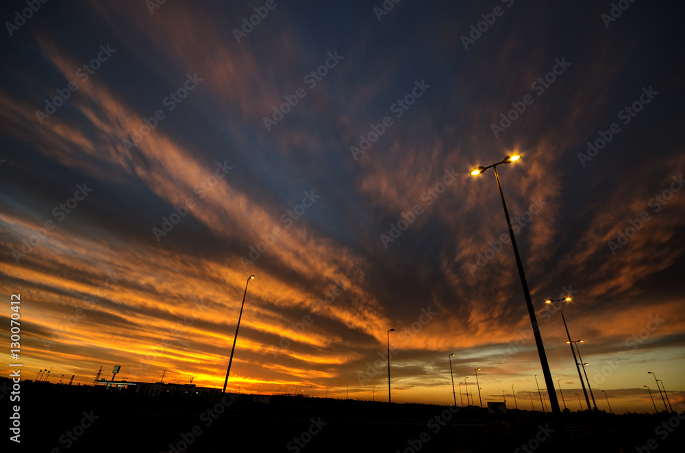 Obraz premium Sunset sky atmosphere make dark multicolor tone on sky or street light against a twilight sky background
