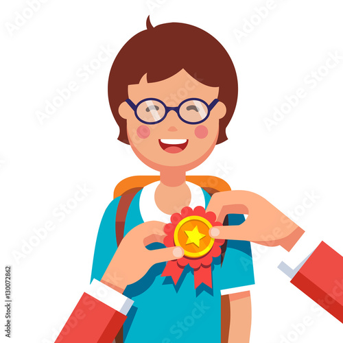 Student boy being awarded for a win at school fair