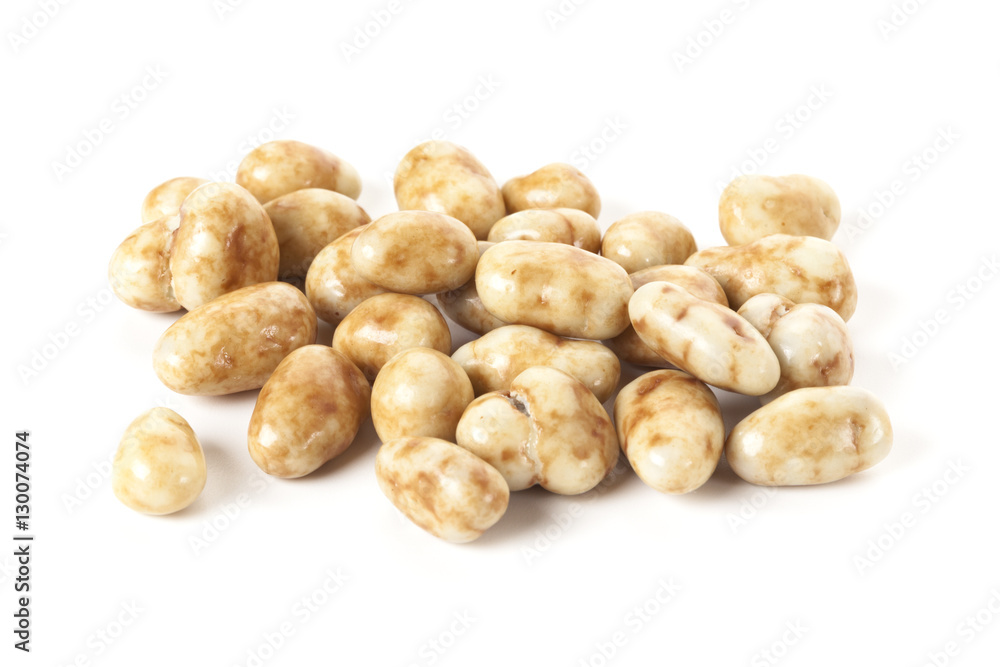 Candied pecan nuts isolated on white background Candied pecan nuts isolated on white background