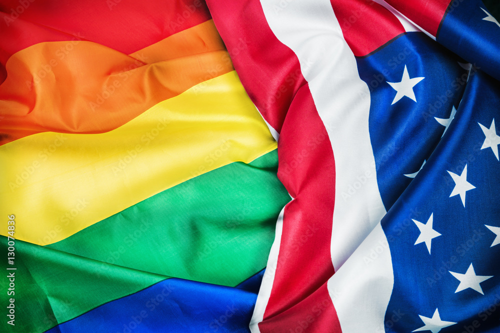 flags of the LGBT community on a background of the American flag flags of the LGBT community on a background of the American flag