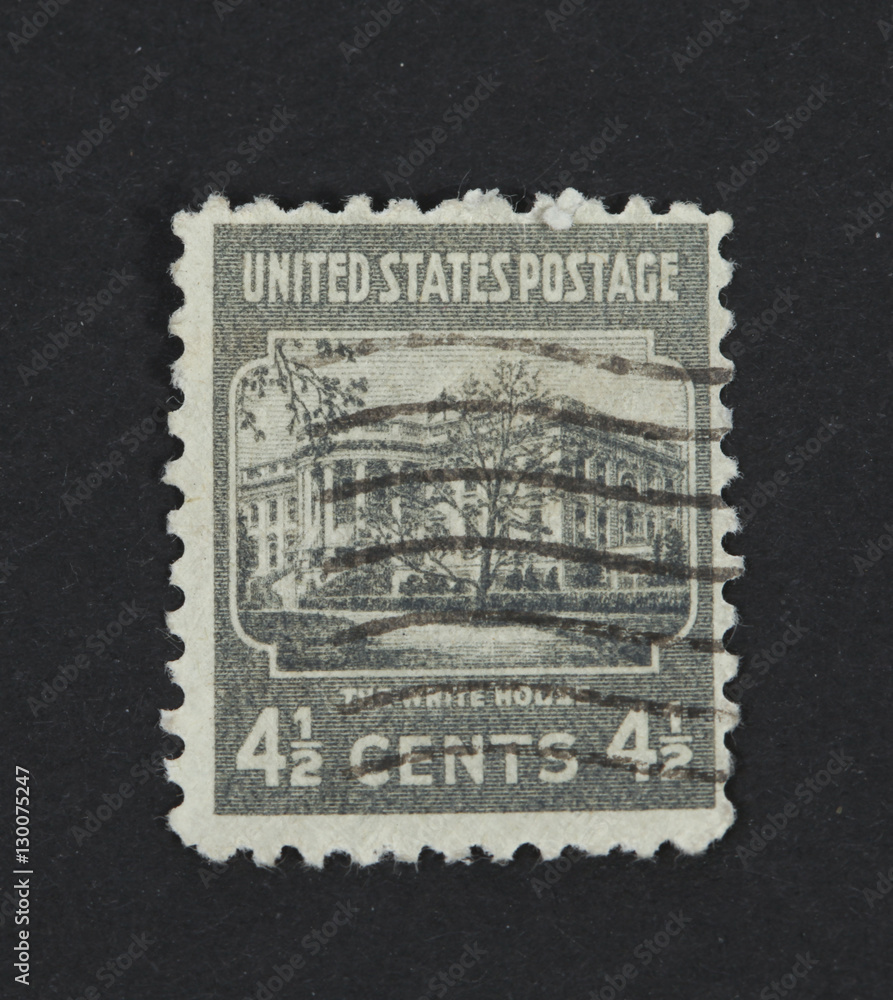 Obraz premium The white house on a vintage postage stamp