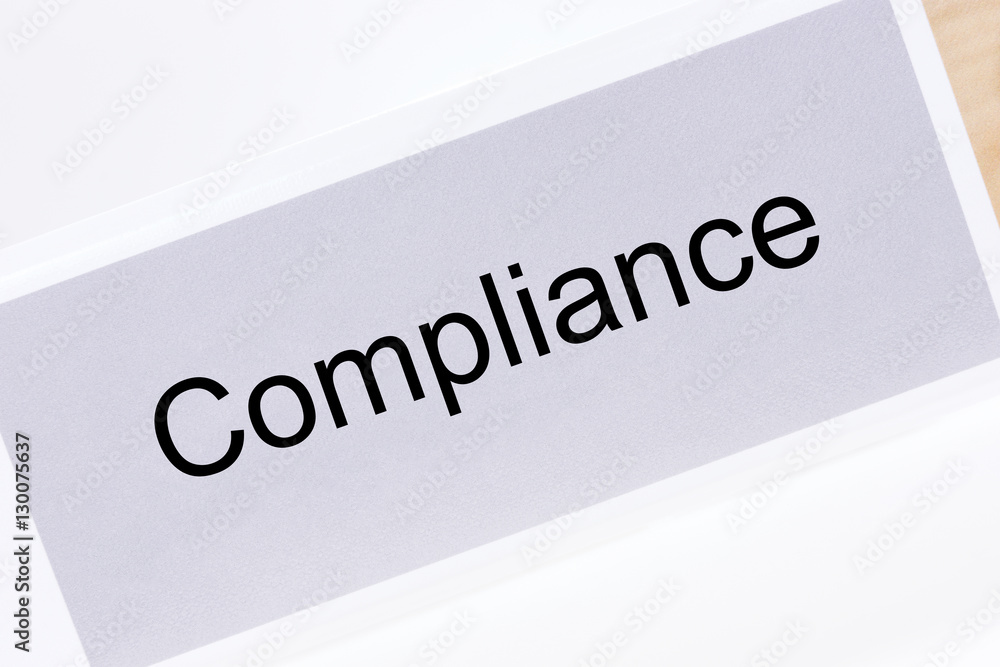 Office folder with the label compliance on white background Office folder with the label compliance on white background