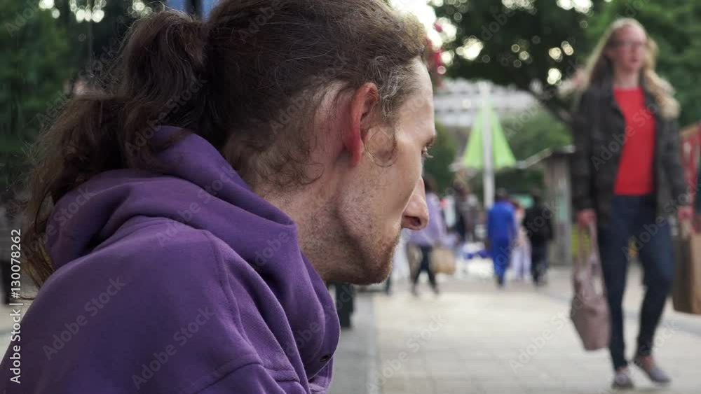 homeless smoking and asking charity: jobless in the street homeless smoking and asking charity: jobless in the street