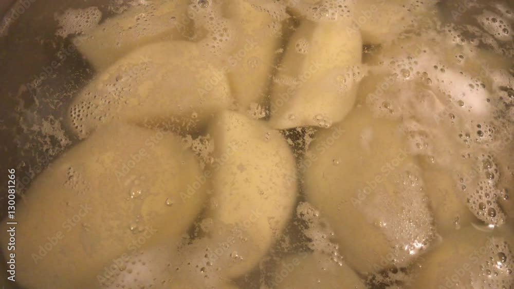 Processing food in the kitchen close-up 4K 2160p 30fps UltraHD footage - Cooking peeled potatoes in boiling water 3840X2160 UHD video Processing food in the kitchen close-up 4K 2160p 30fps UltraHD footage - Cooking peeled potatoes in boiling water 3840X2160 UHD video