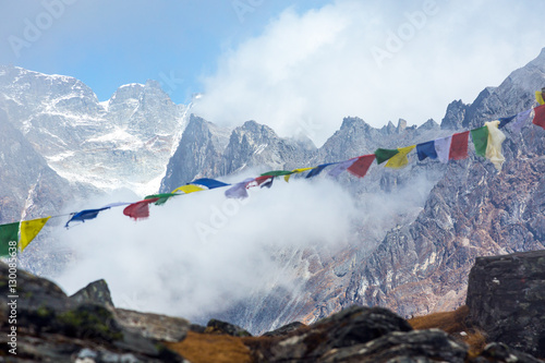 View of High Peaks Range and Prayer Flags in Nepal Himalaya