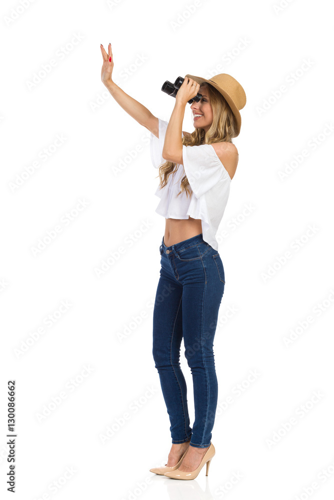 Woman Looking Through Binoculars And Waving Woman Looking Through Binoculars And Waving