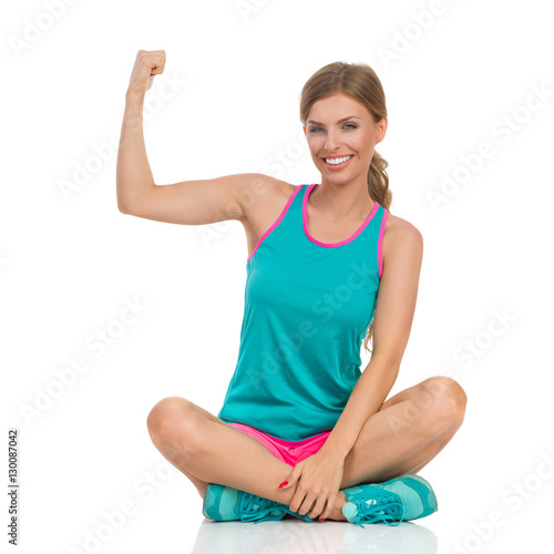 Wallpaper Mural Sitting Sport Woman Rising Fist Torontodigital.ca