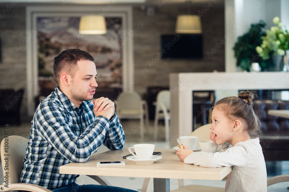 Father And Daughter Having Lunch Together At The Mall Father And Daughter Having Lunch Together At The Mall