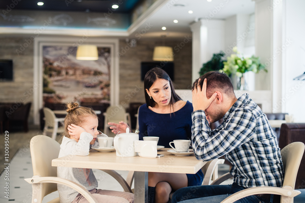 Little girl doesn't want to hear arguing of parents Little girl doesn't want to hear arguing of parents