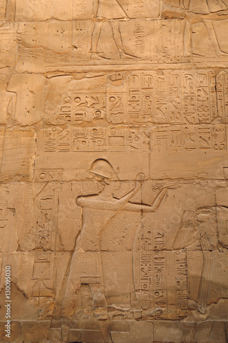 Ancient Egypt. wall are decorated with carved hieroglyphs. Karnak Temple. Luxor. Thebes.