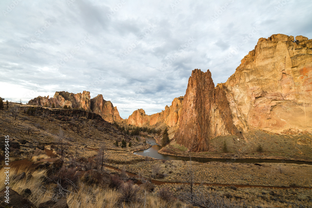 Smith Rock in Oregon with cloudy skies above.