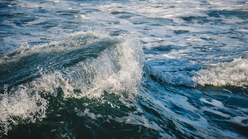Close-up of a beautiful wave. Wave splash details abstract background © Iryna Budanova