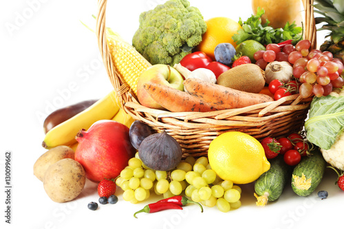 Fototapeta Naklejka Na Ścianę i Meble -  Ripe and tasty fruits and vegetables on a white background