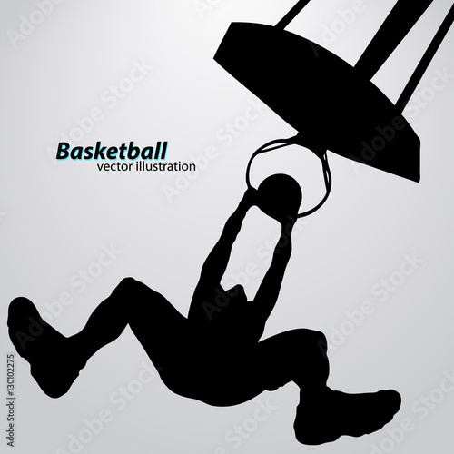 Silhouette of a basketball player.