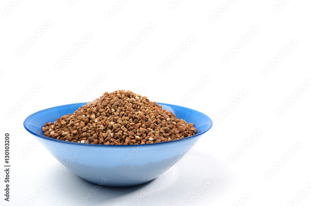 Buckwheat grains from above isolated on white background Buckwheat grains from above isolated on white background