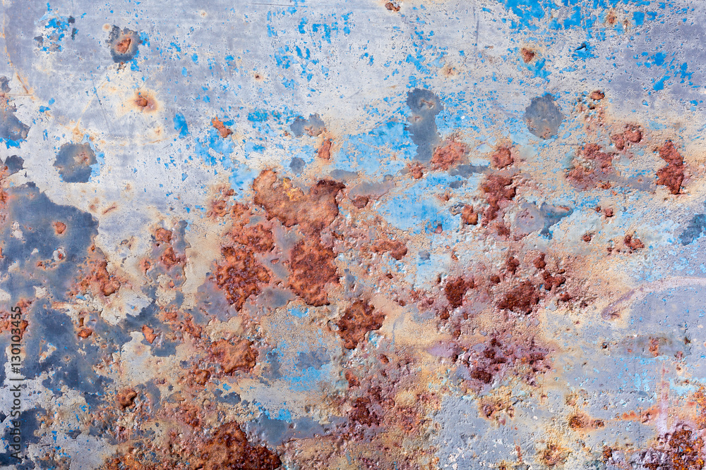 Blue peeling paint and rusty old metal background, texture. Horizontal.