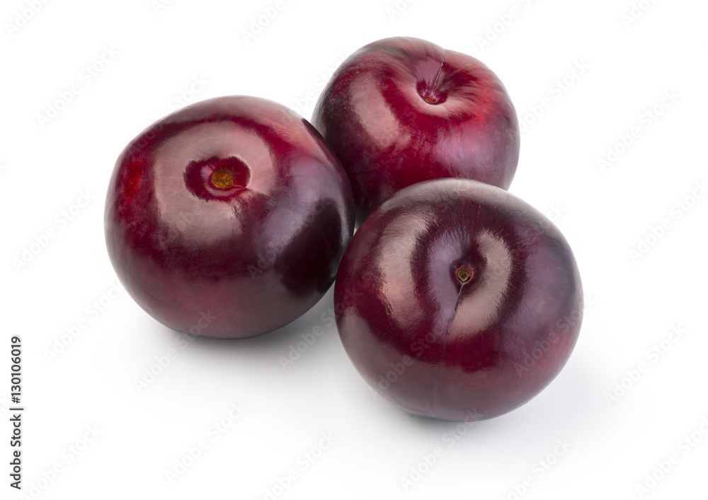 plums are isolated on a white