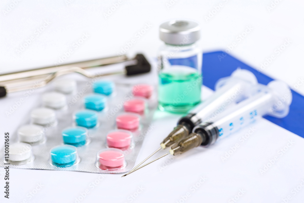Stethoscope, pills and bottles on color background. medicine con Stethoscope, pills and bottles on color background. medicine con