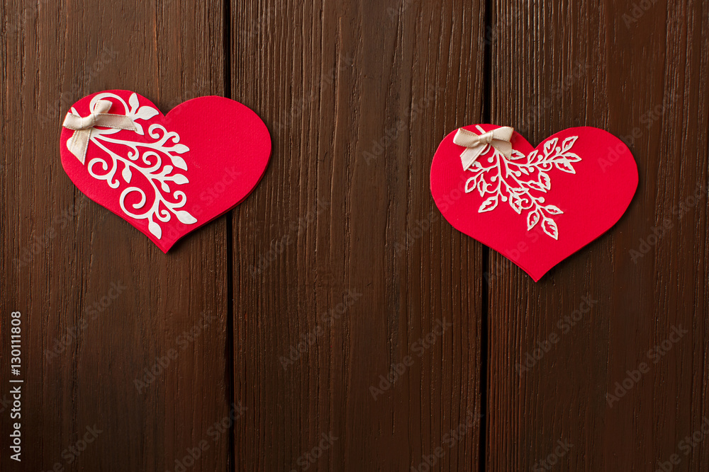 Fototapeta premium Valentine's day background with valentine card on wooden background