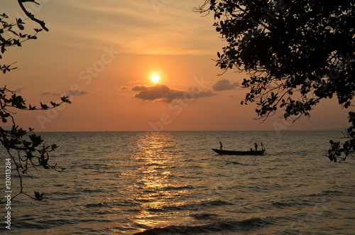 Kep,Cambodia. Fishing boat returns at sunset