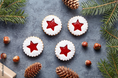 Linzer star cookies with jam traditional Christmas baked sweet dessert shortbread food Xmas celebration pastry sugar powdered holiday snack