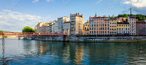 Lyon old buildings along river Saone at sunset