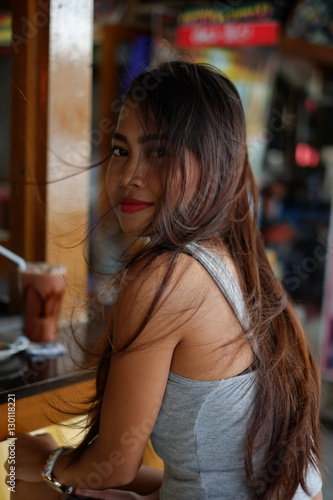 Beautiful asian girl in a restobar