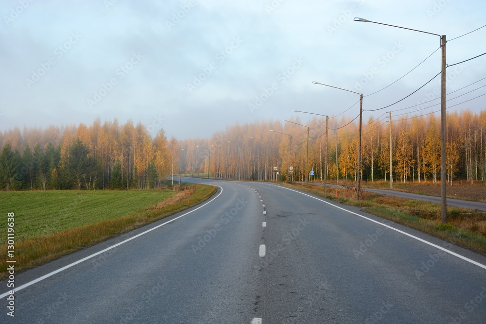 Road in Finland- Morning autumn landscape Road in Finland- Morning autumn landscape