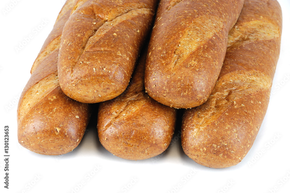 fresh baked wheat hoagie bread isolated on white background