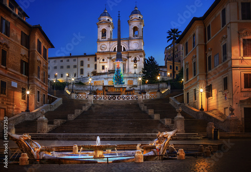 Illuminated Christmas tree in Piazza di Spagna at night, Rome, Italy