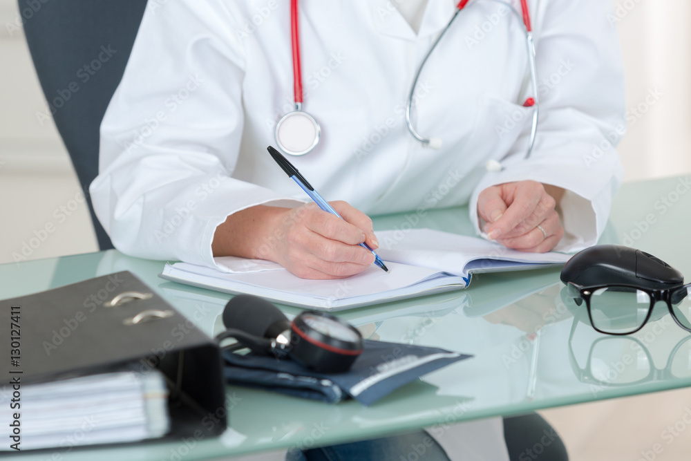 doctor writing notes doctor writing notes