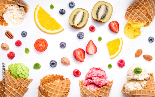 Colorful ice cream with cones and various fruits raspberry ,blue