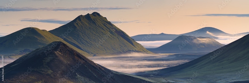 Hilltops and lava fields in Nordunamshraun, seen from Namshraun, Landmannalaugar area, Fjallabak region, Iceland Hilltops and lava fields in Nordunamshraun, seen from Namshraun, Landmannalaugar area, Fjallabak region, Iceland