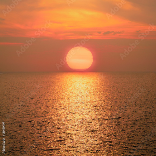 Fototapeta Naklejka Na Ścianę i Meble -  Beautiful big sunrise or sunset over the sea.