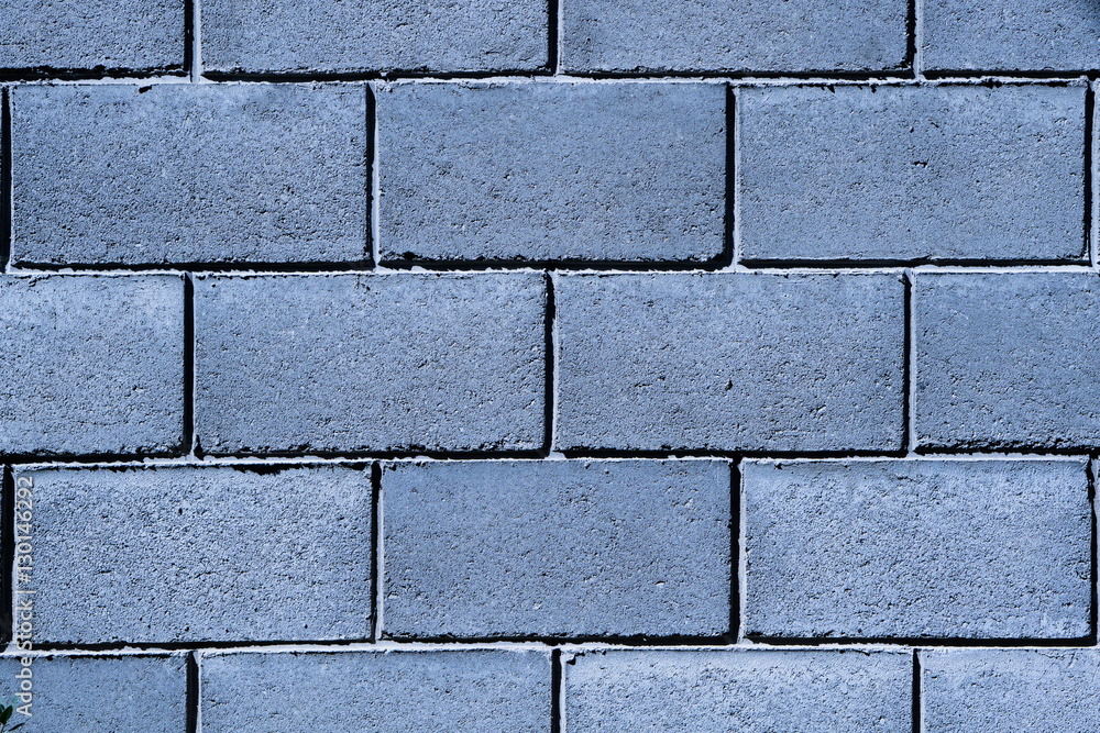 Fototapeta premium Texture of dark blue brick wall