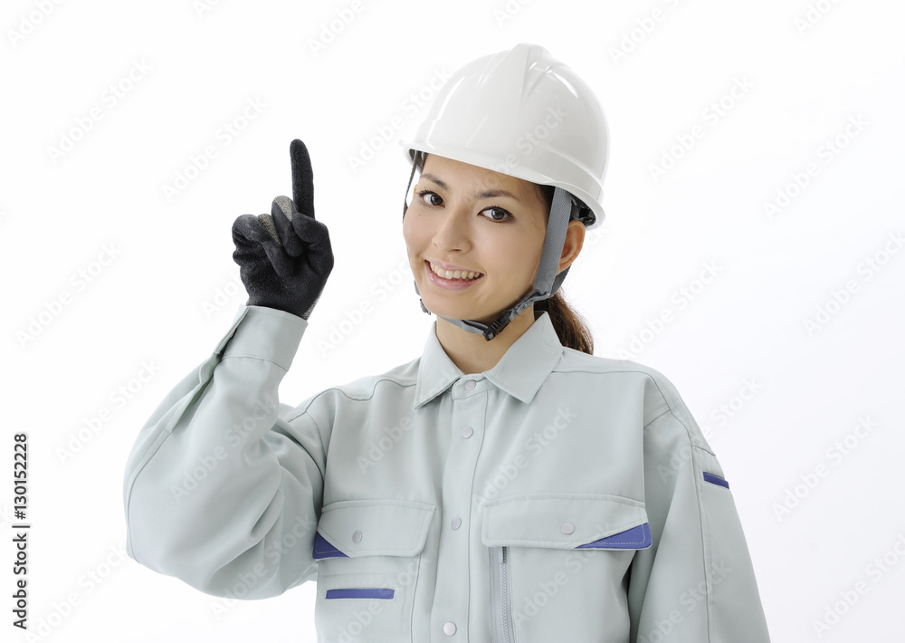 Construction worker pointing with her finger Construction worker pointing with her finger