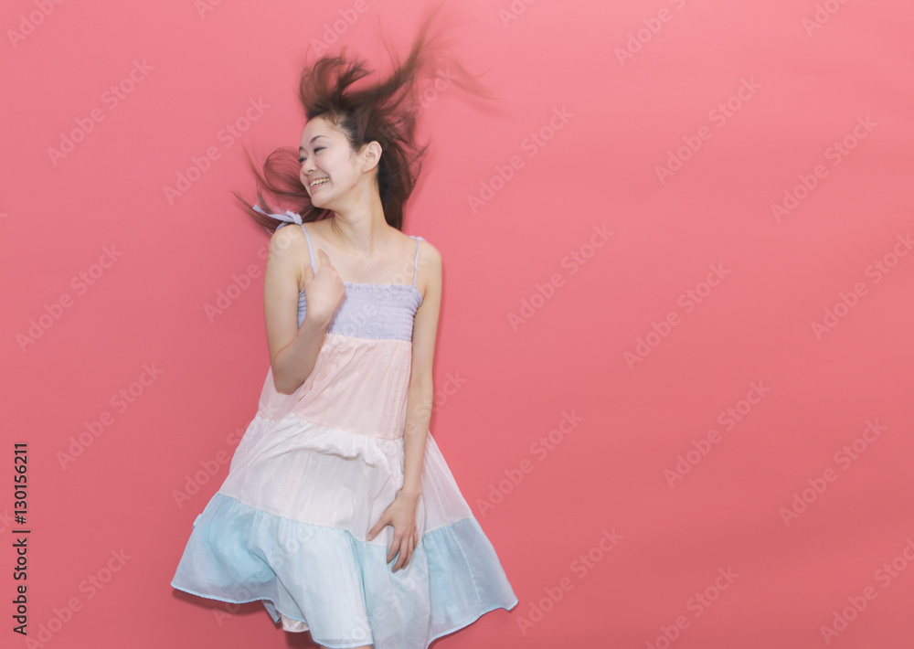 Fototapeta premium Young woman smiling