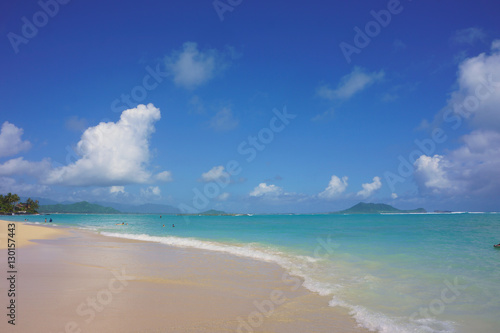 Lanikai beach on the island of Oahu in Hawaii with deep blue sky and light blue ocean © Takeshi