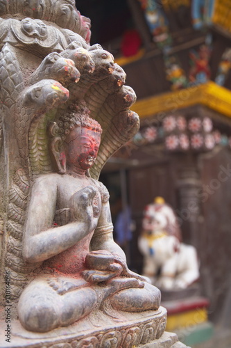 Statue at Bhimsen Temple, Kathmandu, Nepal photo