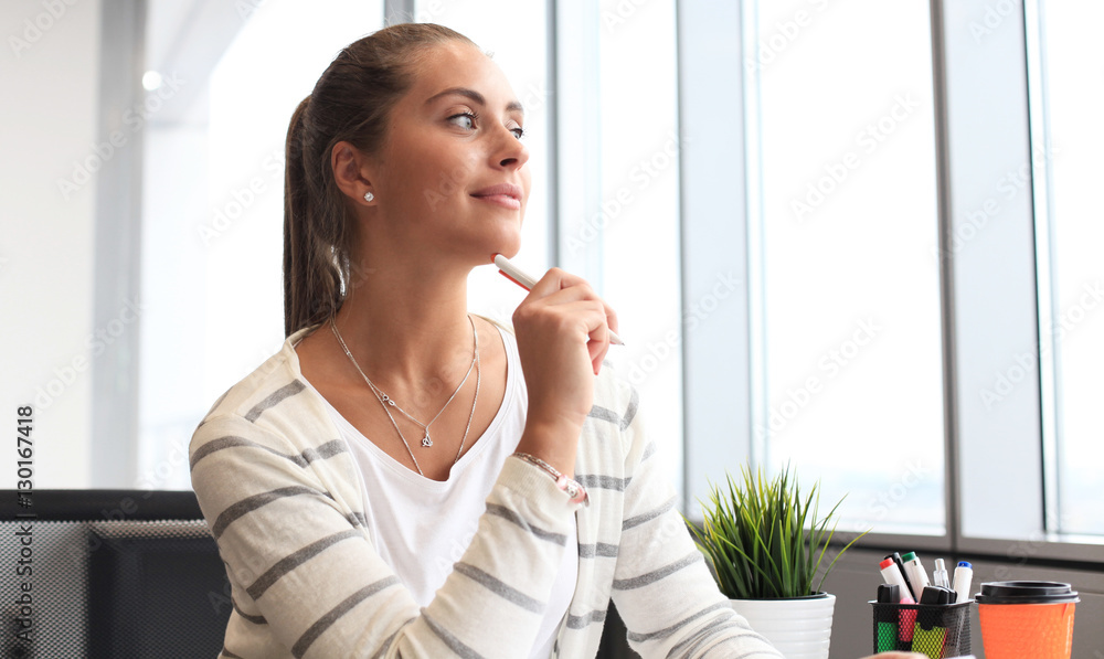 Modern business woman in the office with copy space Modern business woman in the office with copy space
