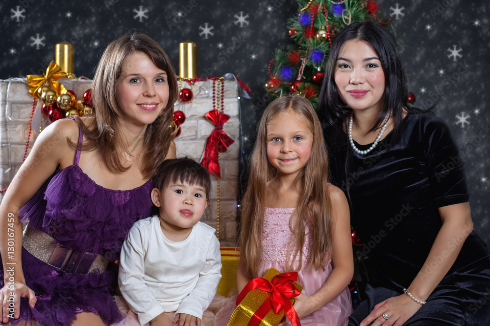Lesbian interracial family in the background of Christmas Lesbian interracial family in the background of Christmas