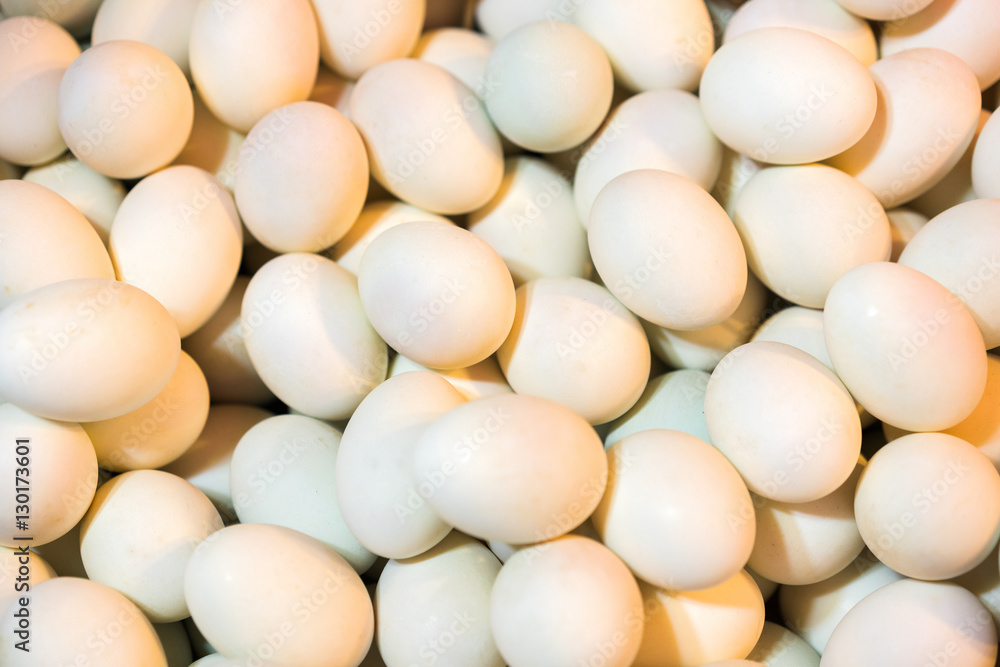 Eggs, background, pattern, protein, diet, natural. Background pattern of multiple small white eggs viewed as a layer from above. Many hens eggs on background. Eggs, background, pattern, protein, diet, natural. Background pattern of multiple small white eggs viewed as a layer from above. Many hens eggs on background.