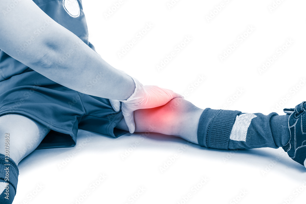 Asian soccer player thigh pain, isolated on white background. 