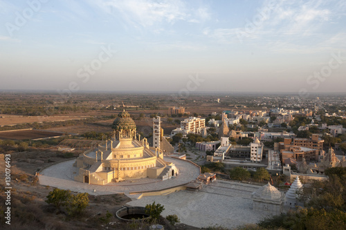 Jain temple, newly constructed, at the foot of Shatrunjaya Hill, in the early morning sunshine, Palitana, Gujarat
