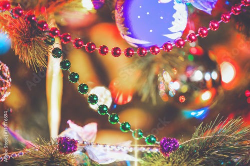 Beautiful garlands weigh on tree close-up