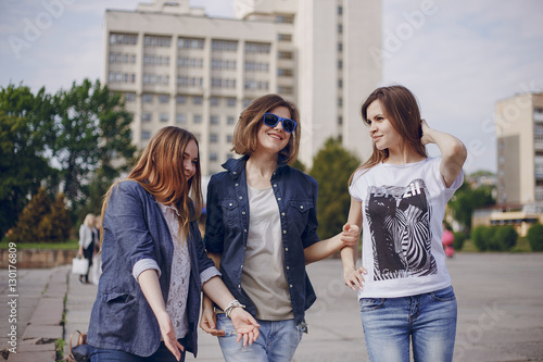 three beautiful girls on walk © hetmanstock2