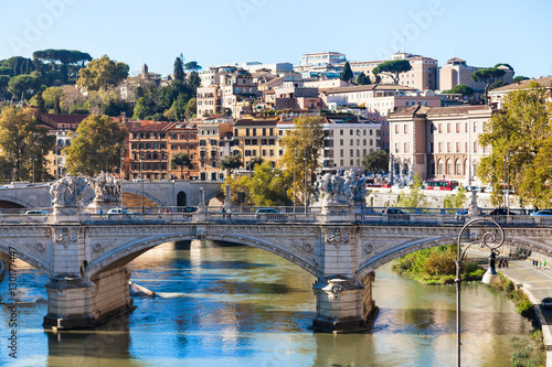 Rome city skyline with Tiber River and bridge