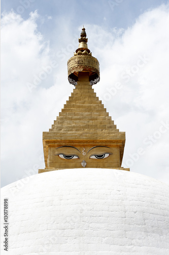 Buddha's eyes on stupa in the grounds of Khamsum Yulley Namgyal, consecrated in 1999, Punakha, Western Bhutan photo