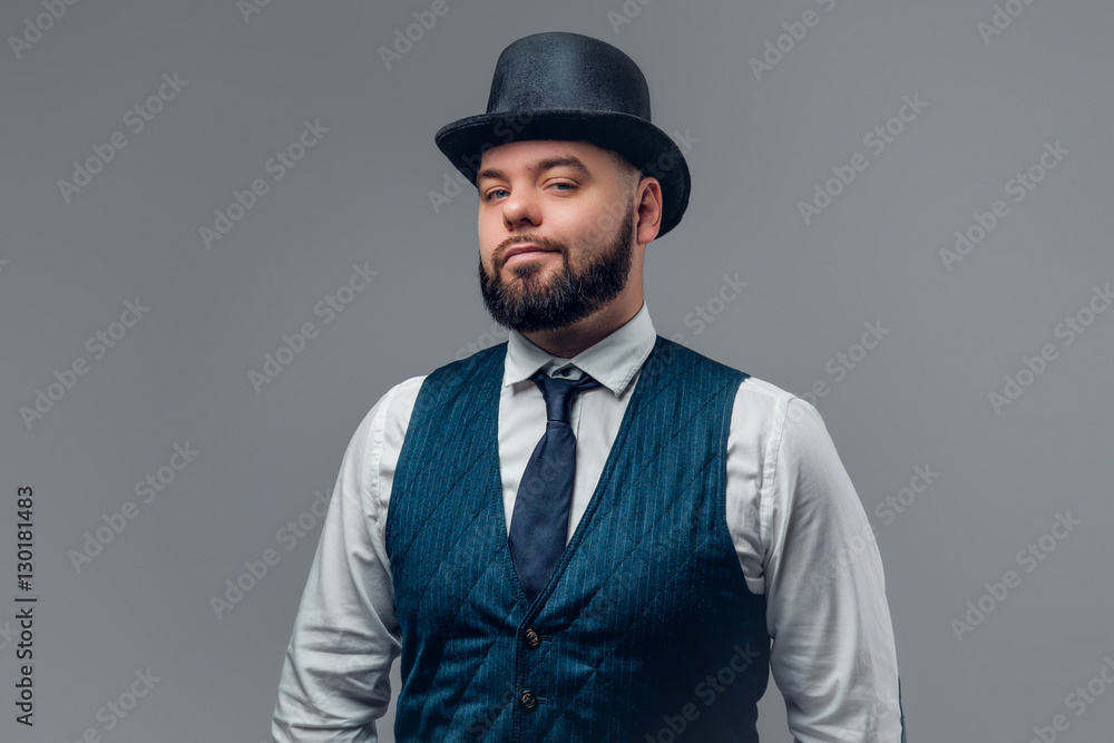 Bearded man wearing cylinder hat and waistcoat. Bearded man wearing cylinder hat and waistcoat.